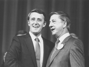 FILE -- Erik Nielsen (R) poses for a photo with Brian Mulroney in Ottawa June 11, 1983.
