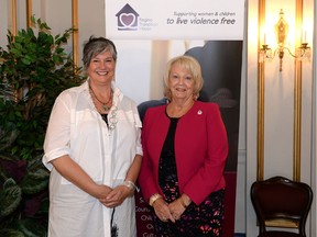 Maria Hendrika, left, and  Lieutenant Governor Vaughn Solomon Schofield at Government House during a celebration of the 40th year Regina Transition House has supported women in Regina.