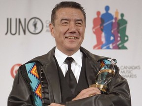 The Humanitarian Award recipient Tom Jackson poses with his award at the Juno Awards gala dinner in Saskatoon, Sask. Saturday, March 31, 2007. Travellers stranded by a blizzard in a Manitoba town got a treat on Tuesday night when Jackson put on an impromptu concert in the storm shelter.