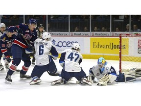 Saskatoon Blades goalie Logan Flodell was able to keep the puck out during one of many scrambles in front of his net Saturday night. Flodell stopped 39 of 40 shots en route to a 2-1 overtime win versus the Regina Pats at the Brandt Centre.