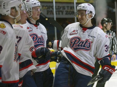 Regina Pats forward Lane Zablocki, 39, celebrates Adam Brooks' unassisted goal against the Brandon Wheat Kings during a game at the Brandt Centre in Regina, Sask. on Tuesday Dec. 27, 2016.