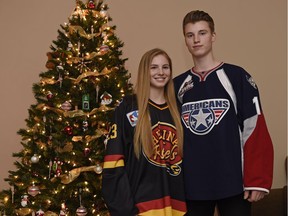 Hockey players Lauren, left, and Carson Focht are enjoying time at home in Regina during the Christmas break.