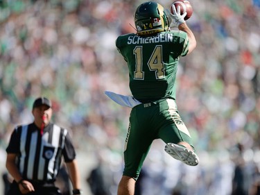 University of Regina Rams' Ryan Schienbein catches the very first ever touchdown during a game against the University of Saskatchewan Huskies at the new Mosaic Stadium in Regina.  This is the first event ever held at the new stadium.