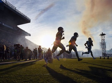 Saskatchewan Roughriders take the field at the start of a CFL game against the Toronto Argonauts at Mosaic Stadium in Regina on June 30, 2016.  DON HEALY / Regina