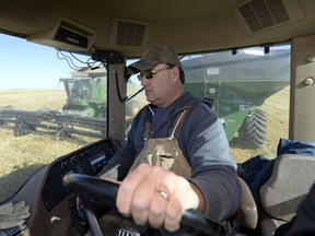 Todd Lewis harvests just outside of Gray, 40 km southeast of Regina, in this 2013 file photo.  Lewis was elected president of the Agricultural Producers Association of Saskatchewan at the association's AGM earlier this week.