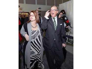 Premier Brad Wall gestures to supporters at the Palliser Pavilion in his home riding of Swift Current after his third election win in Saskatchewan.