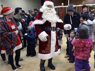 Santa braved the cold to see the children at the Light the Lights event at City Hall.