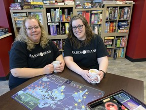 Carole Carman (left) and her daughter Stephanie Smith co-own Boards N Beans, Regina's first board games cafe.