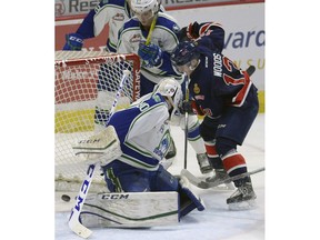 Riley Woods scores the Teddy Bear goal on Swift Current Broncos goalie Taz Burman during WHL action at the Brandt Centre on Friday.