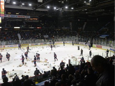 Teddy bears get tossed onto the ice at the Dec. 9 Pats game.