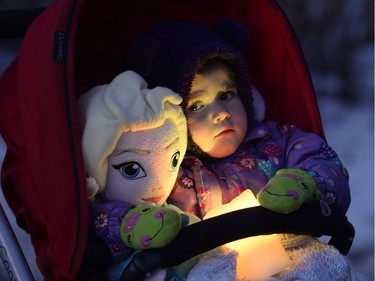 A candlelight vigil for La Loche was held in Regina Wednesday night 2 year old Adalyn Moskal came to the vigil with her mom Lyndsay.