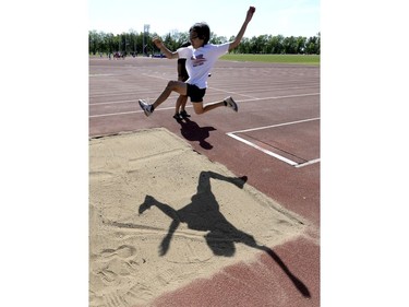 Photos from the Regina Catholic Schools elementary track and field championships. Tony Anonas, grade 7 at St. Peters in the junior boys long jump.