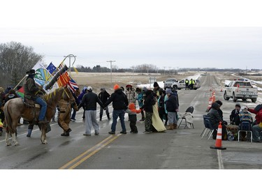 Members of the Peepeekisis First Nation holding a demonstration on Highway 10 near Balcarres to press demands with the federal government for proper negotiations and consultation over a new Contribution Funding Agreement (CFA). The band says the government is forcing it to sign the agreement or risk repercussions.