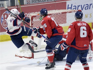 Pats' Rykr Cole scores the eventual game winner on Lethbridge goal tender Stuart Skinner during game three of WHL playoff action between the Lethbridge Hurricanes and the Regina Pats at the Brandt Centre in Regina Tuesday night.