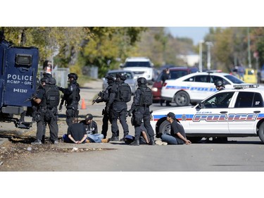 Police execute a high risk warrant  on the 1200 block Angus St. Tuesday morning. At least 7 people were taken into custody.