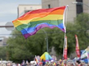 A pride flag flies over the Queen City Pride Parade in Regina, Sask. on Saturday June. 25, 2016.