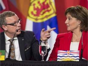 Now that B.C. Premier Christy Clark (right) has said she will stop accepting a salary from the B.C. provincial Liberal party, Saskatchewan Premier Brad Wall is the only premier in Canada to accept a stipend from his party.