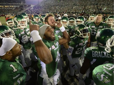 Saskatchewan Roughriders quarterback Darian Durant (4) leads his team on the field as they face the Hamilton Tiger-Cats in the Grey Cup Sunday November 24, 2013 in Regina.