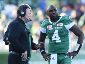 Saskatchewan Roughriders head coach, general manager and vice-president of football operations Chris Jones, left, has severed ties with veteran quarterback Darian Durant, right.