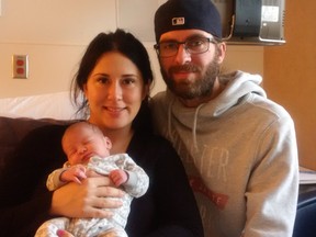 Baby Jaxtyn Carter Kinvig with parents Samantha Lawrence and Carter Kinvig.
