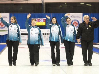 MELVILLE, SASK : January 29, 2017 - Penny Barker, Deanna Doig, Lorraine Schneider, Danielle Sicinski, and coach Merv Fonger are presented as the winners of the Scotties Women's Provincial final held in Melville, Saskatchewan. MICHAEL BELL / Regina Leader-Post.