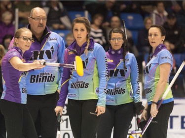 Team Silvernagle discusses options during the Scotties Women's Provincial final held in Melville, Saskatchewan.