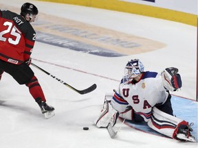 United States goalie Tyler Parsons makes the winning save on Canada's Nicolas Roy during Thursday's shootout in the gold-medal game at the world junior hockey championship.