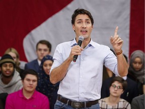 Prime Minister Justin Trudeau takes questions at a town hall meeting in Calgary on Tuesday, Jan. 24, 2017.