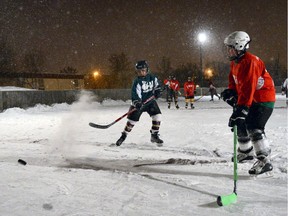 The Sport Venture Library makes equipment available for initiatives such as the Outdoor Hockey League, shown in this file photo.
