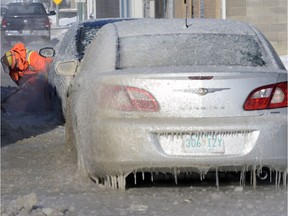 A water main break in February of 2014 encased a couple vehicles in ice on the 1000 block of Winnipeg Street.