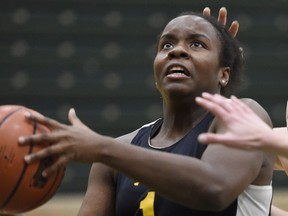 Kyanna Giles drives the basket during a Regina Cougars recent practice.