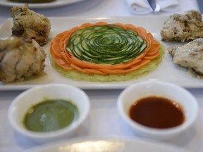 Head chef Vinu Paily prepared a beautiful garnish of cucumbers and carrots at Tamarind restaurant in Regina.