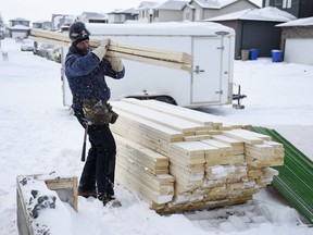 The extreme cold  didn't stop Darren Stephenson of Teak Builders from framing a home under construction in Harbour Landing in Regina.
