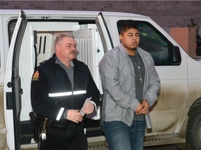 Elijah Noname, right, arrives to Court of Queen's Bench in January. Noname was found guilty of manslaughter in the Nov. 1, 2013 death of 18-year-old Nolen Boyd Tanner.