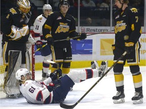 Regina Pats forward Filip Ahl, 61, takes a tumble in front of the Brandon Wheat Kings' net Sunday at the Brandt Centre.