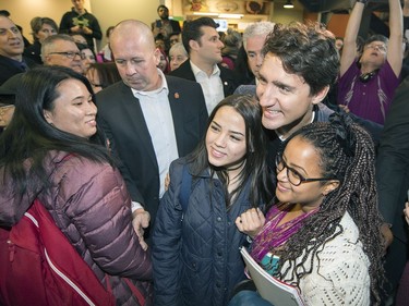 Prime Minister Justin Trudeau takes a selfie during his walking tour on the University of Regina campus in Regina.