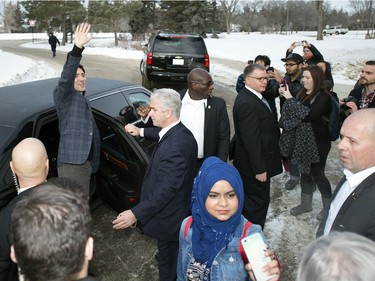 Prime Minister Justin Trudeau waves good-bye to the crowd after his walking tour on the University of Regina campus in Regina.