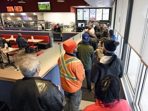 A long line of eager customers were on hand for the official opening of Fuddruckers restaurant in Regina.