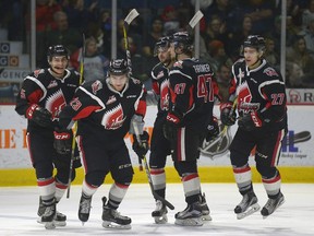 Tristin Langan, 23, celebrates the Moose Jaw Warriors' first goal Saturday against the host Regina Pats.