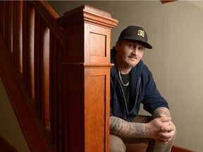 Glenn McNeil sits at his home in Regina. McNeil graduated from drug treatment court in 2013, which he credits for saving his life.