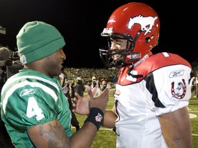 Darian Durant, left and Henry Burris, shown after the CFL's 2009 West Division final on Taylor Field, left the Saskatchewan Roughriders under similar circumstances.