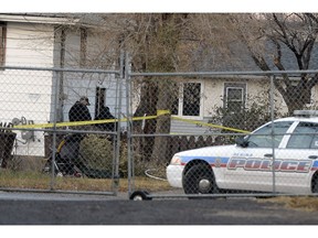 Regina police at a homicide scene.