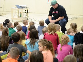 Roughriders Dan Clark speaks to students at Lakeview School about bullying and the Red Cross Pink Day 2017 campaign in Regina.