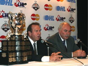 Gord Kirke, left, shown with CHL president David Branch in a 2010 file photo, is the chairman of the 2018 Memorial Cup site selection committee.