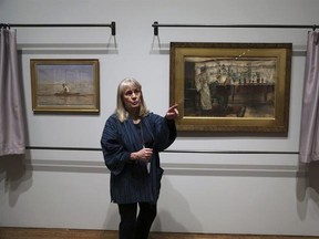 In this Tuesday Feb. 21, 2017 photo, Kathleen A Foster, Senior Curator of American Art at the Philadelphia Museum of Art speaks in front of two watercolor paintings in Philadelphia. &ampquot;American Watercolor in the Age of Homer and Sargent&ampquot; will be on view from March 1 to May 14, 2017, bringing together masterpieces drawn from public and private collections throughout the county, and will be shown only in Philadelphia. (AP Photo/Jacqueline Larma)
