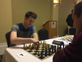 Isaac Wiebe, a chess player from Winnipeg, takes part in a game Saturday, Feb. 18 at the Executive Royal Hotel in Regina as part of the South Saskatchewan Chess Championship. PHOTO ASHLEY ROBINSON