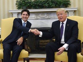 Prime Minister Justin Trudeau meets with U.S. President Donald Trump in the Oval Office of the White House, in Washington, D.C., on Monday, Feb. 13, 2017.