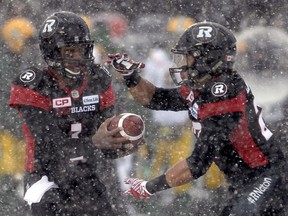 Henry Burris, shown handing off to Kienan LaFrance while with the Ottawa Redblacks, lauds the talents of the 25-year-old running back.
