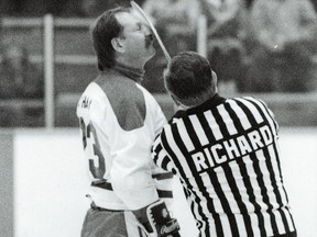 Guest referee Maurice (Rocket) Richard uses Eddie Shack's nose to measure a stick on Jan. 14, 1988 during an old-timers hockey game at the Fort Qu'Appelle Rexentre.