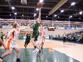 Caitlin Zacharias, 5, of the University of Regina Cougars drives to the net during Saturday's Canada West women's basketball game against the Thompson Rivers WolfPack.